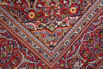 Kashan-style navy rug, pile texture detail showing dense wool