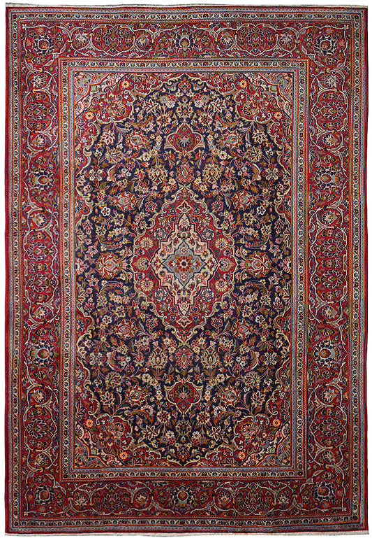 7.9 x 11.2 Kashan-style hand-knotted wool rug in navy blue with ivory medallion, top view