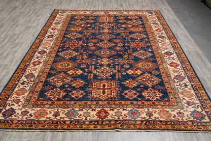 Royal blue Super Kazak rug, central medallion close-up in ivory and red
