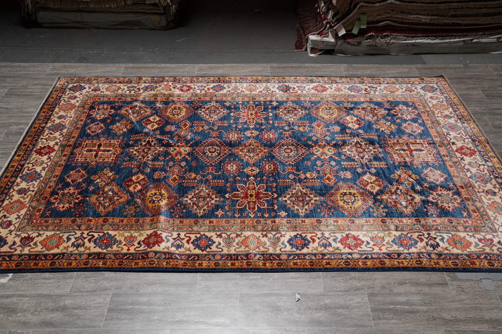 Royal blue Super Kazak rug, tribal motif detail