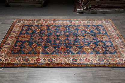 Royal blue Super Kazak rug, tribal motif detail