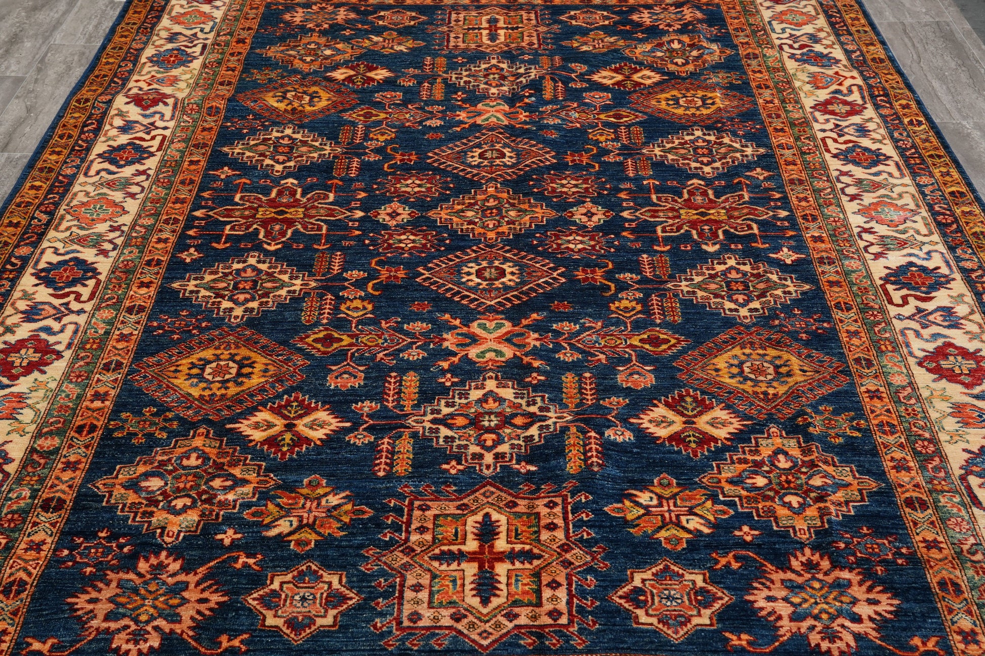 Royal blue Super Kazak rug, border pattern detail in ivory and rust