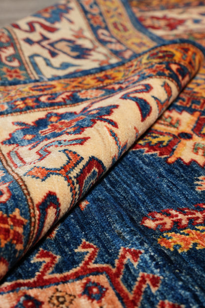 Royal blue Super Kazak rug, color balance close-up showing blue field