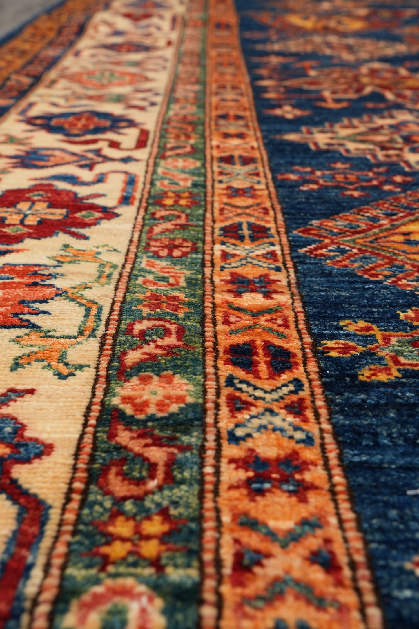 Royal blue Super Kazak rug, secondary border pattern detail