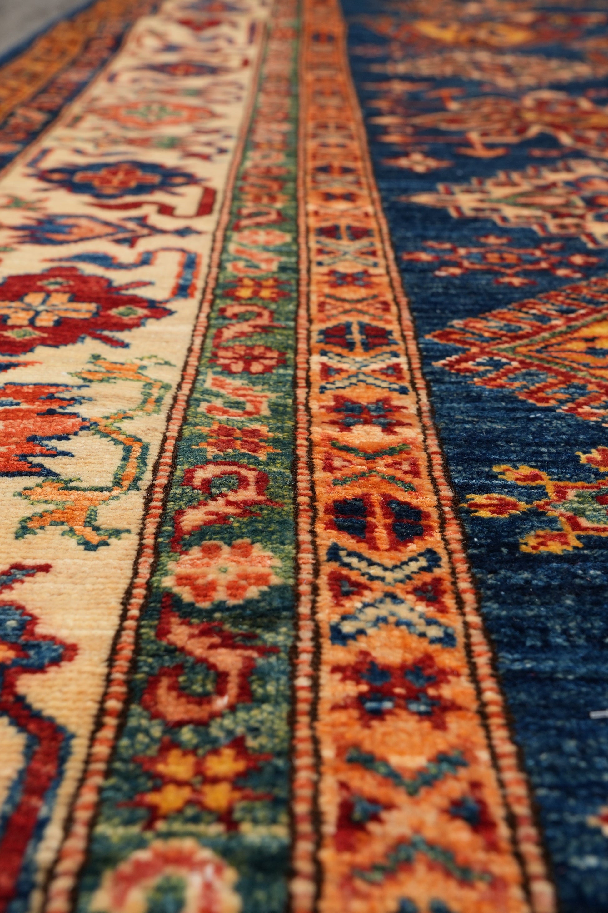 Royal blue Super Kazak rug, secondary border pattern detail
