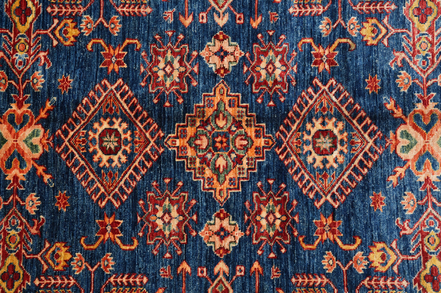 Royal blue Super Kazak rug, pile texture showing silky Afghan wool
