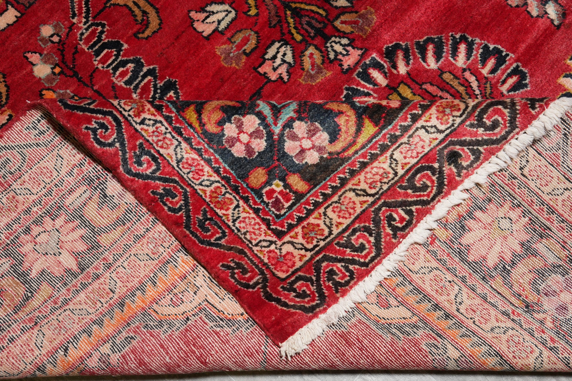 Vintage traditional floral rug, edge and selvedge detail