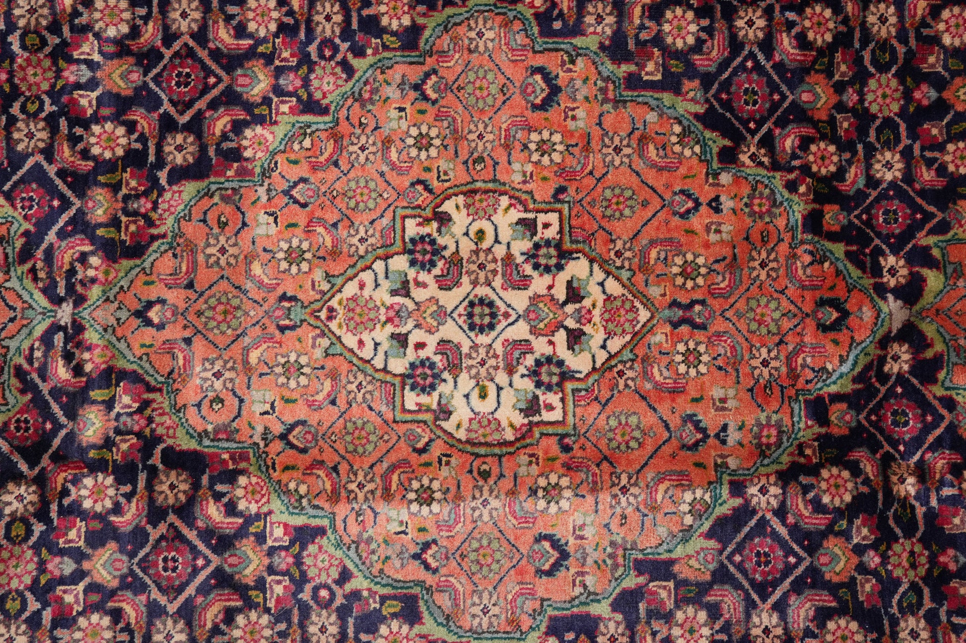 Tabriz-style Mahi rug, secondary Mahi cluster close-up