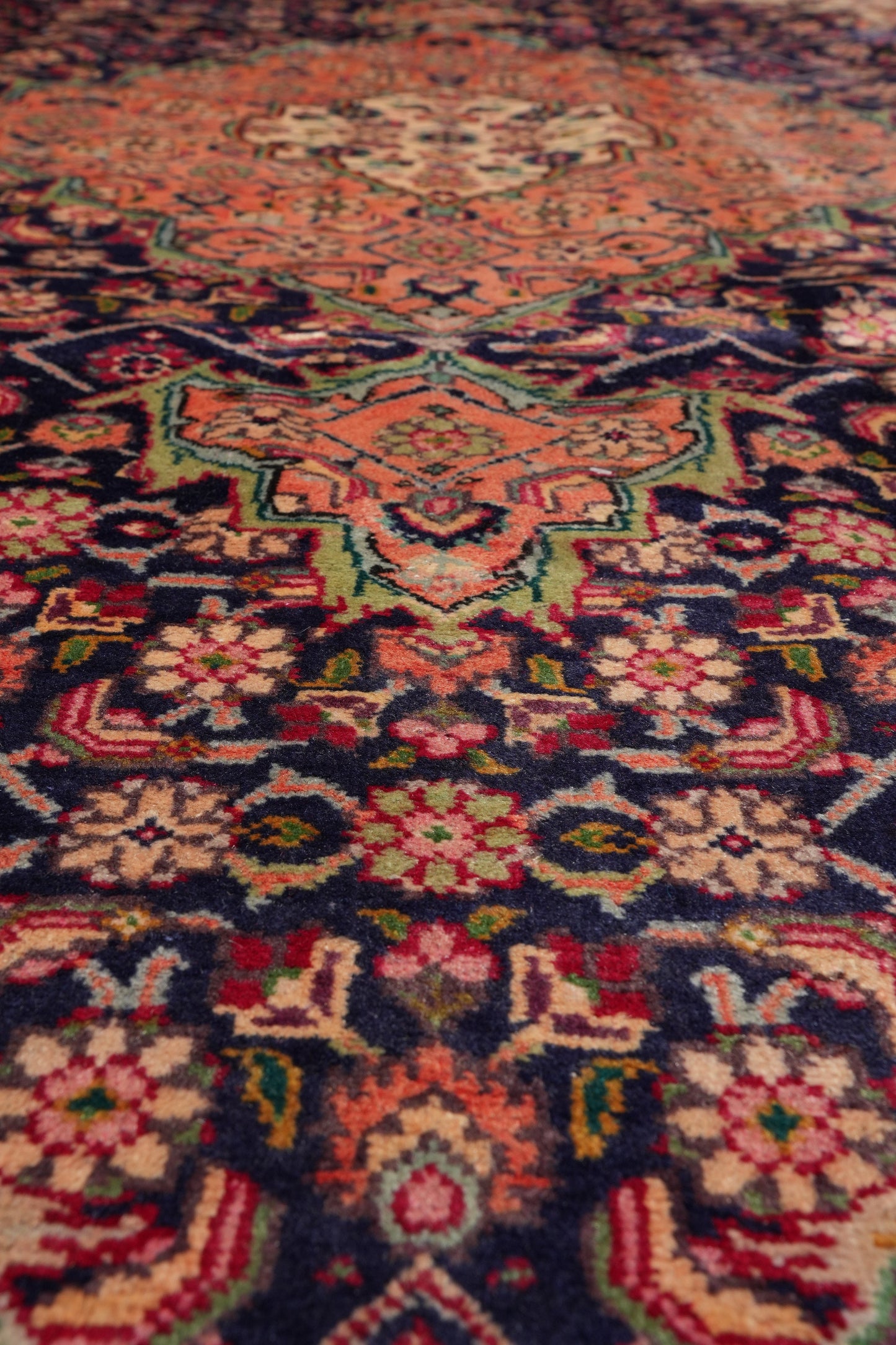 Tabriz-style Mahi rug, color balance close-up showing navy field