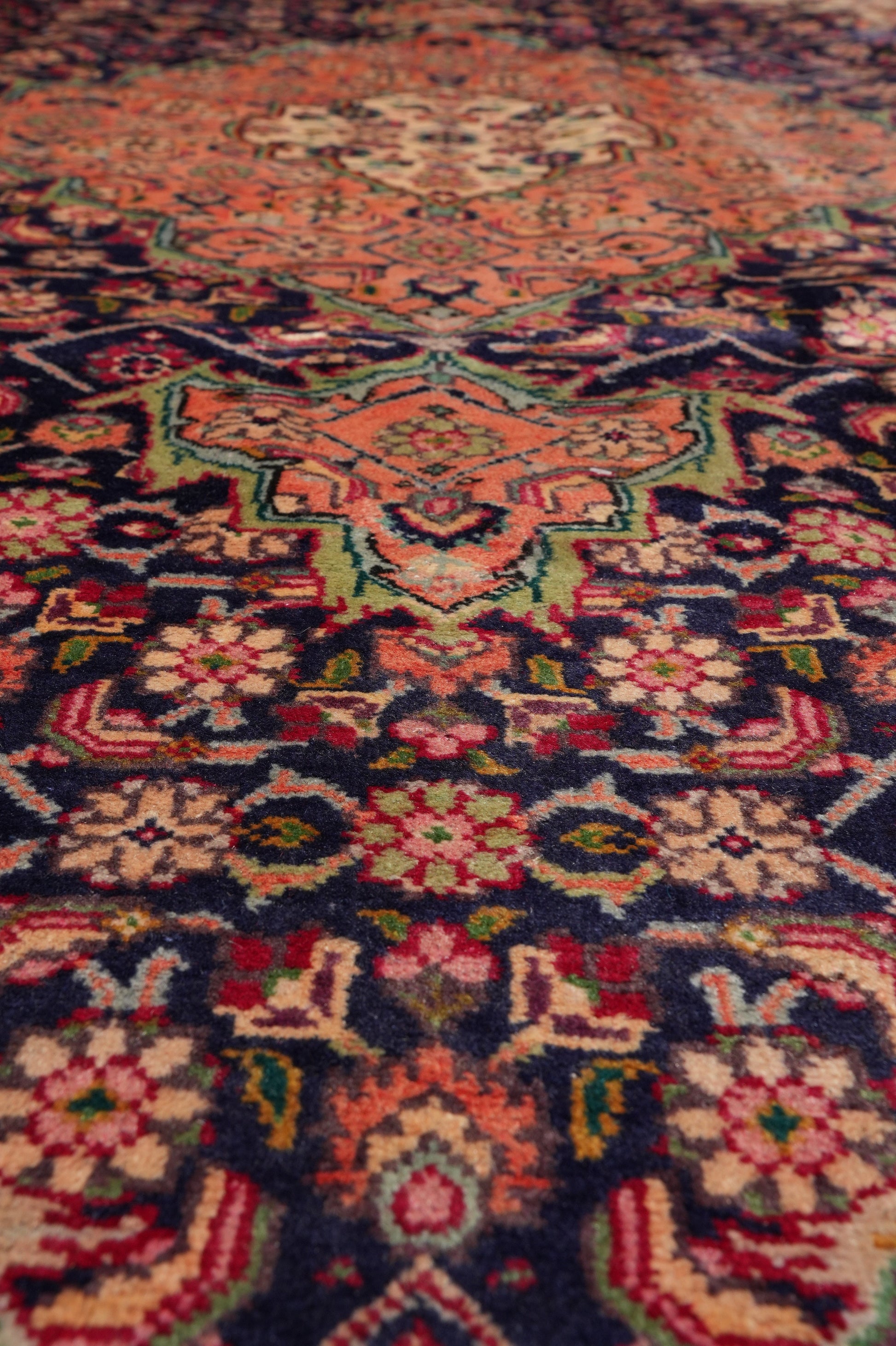 Tabriz-style Mahi rug, color balance close-up showing navy field