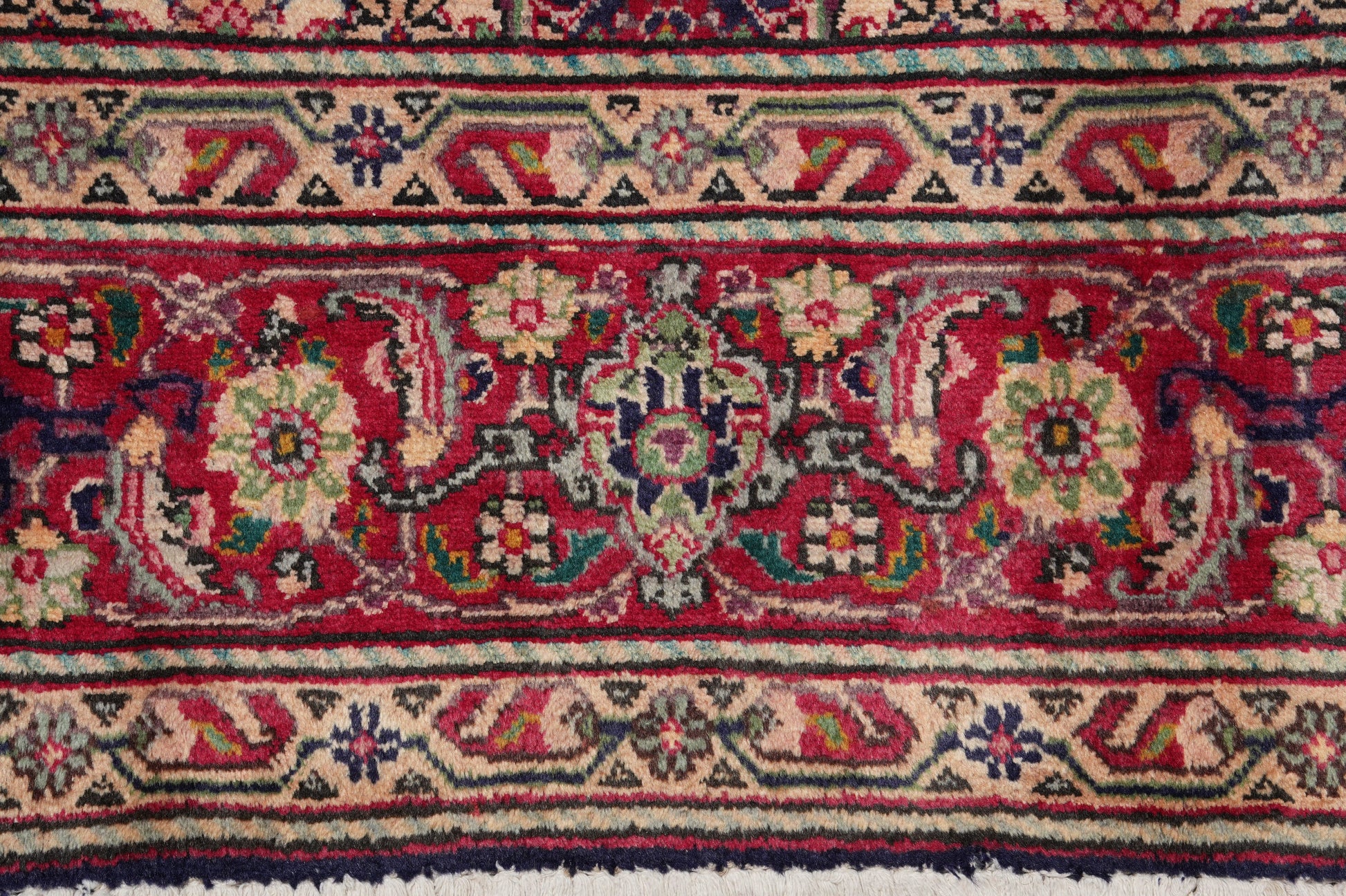 Tabriz-style Mahi rug, pile texture showing aged wool patina