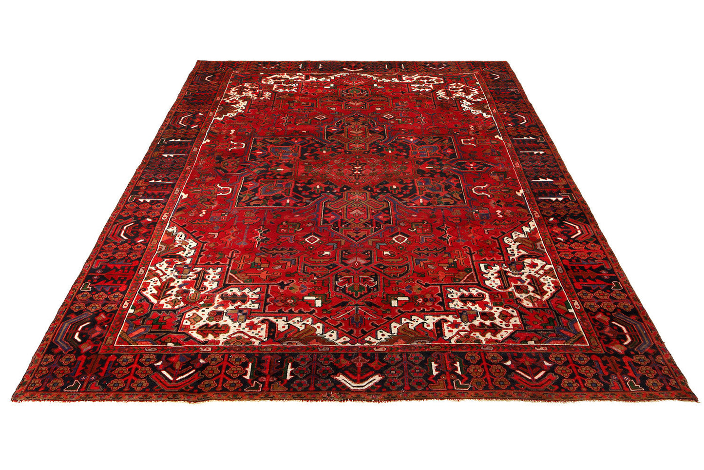 Tribal Heriz-style rug, central medallion close-up with off-center tribal character