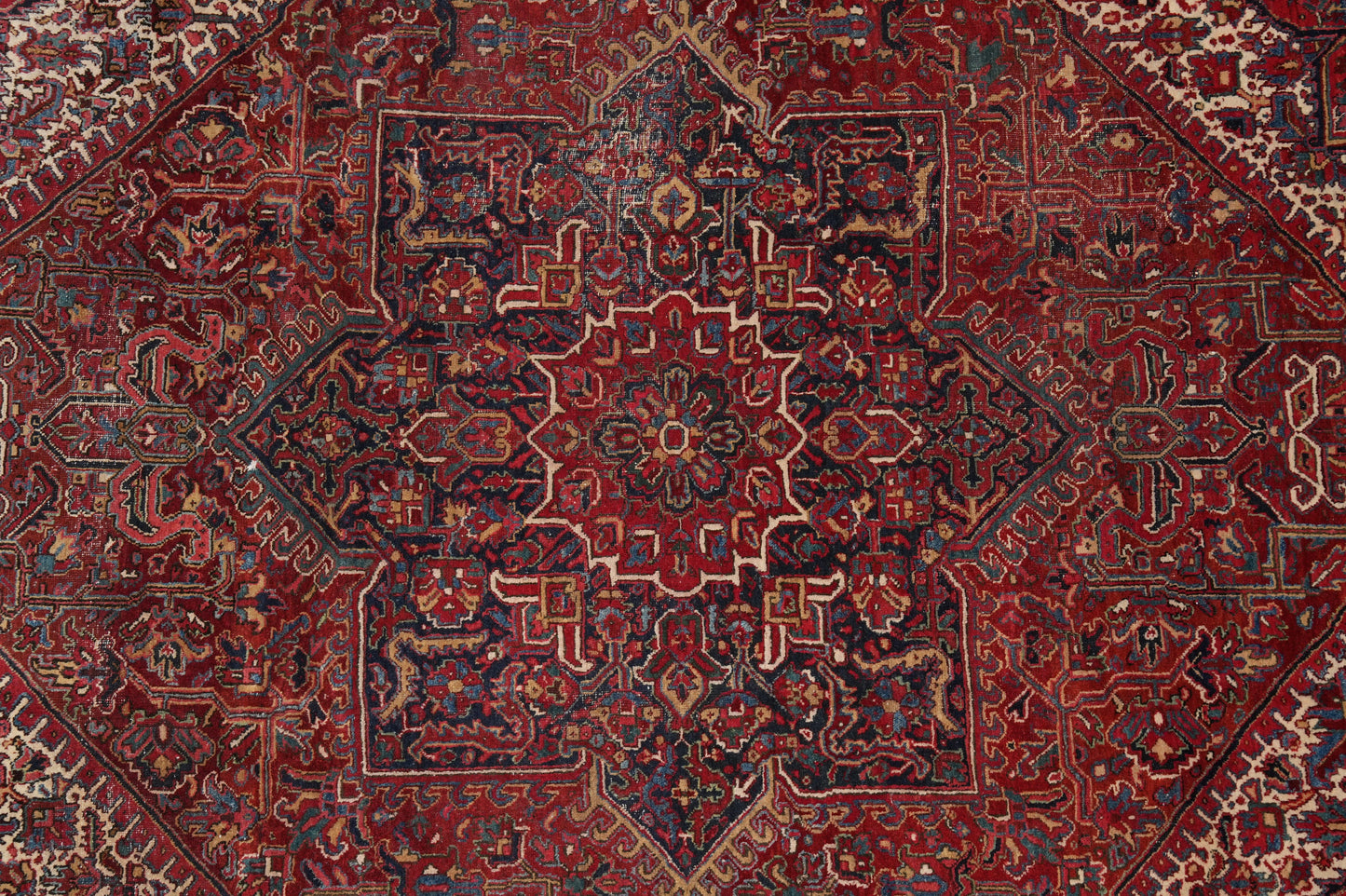 Strong tribal Heriz-style rug, field detail showing red depth and color contrast