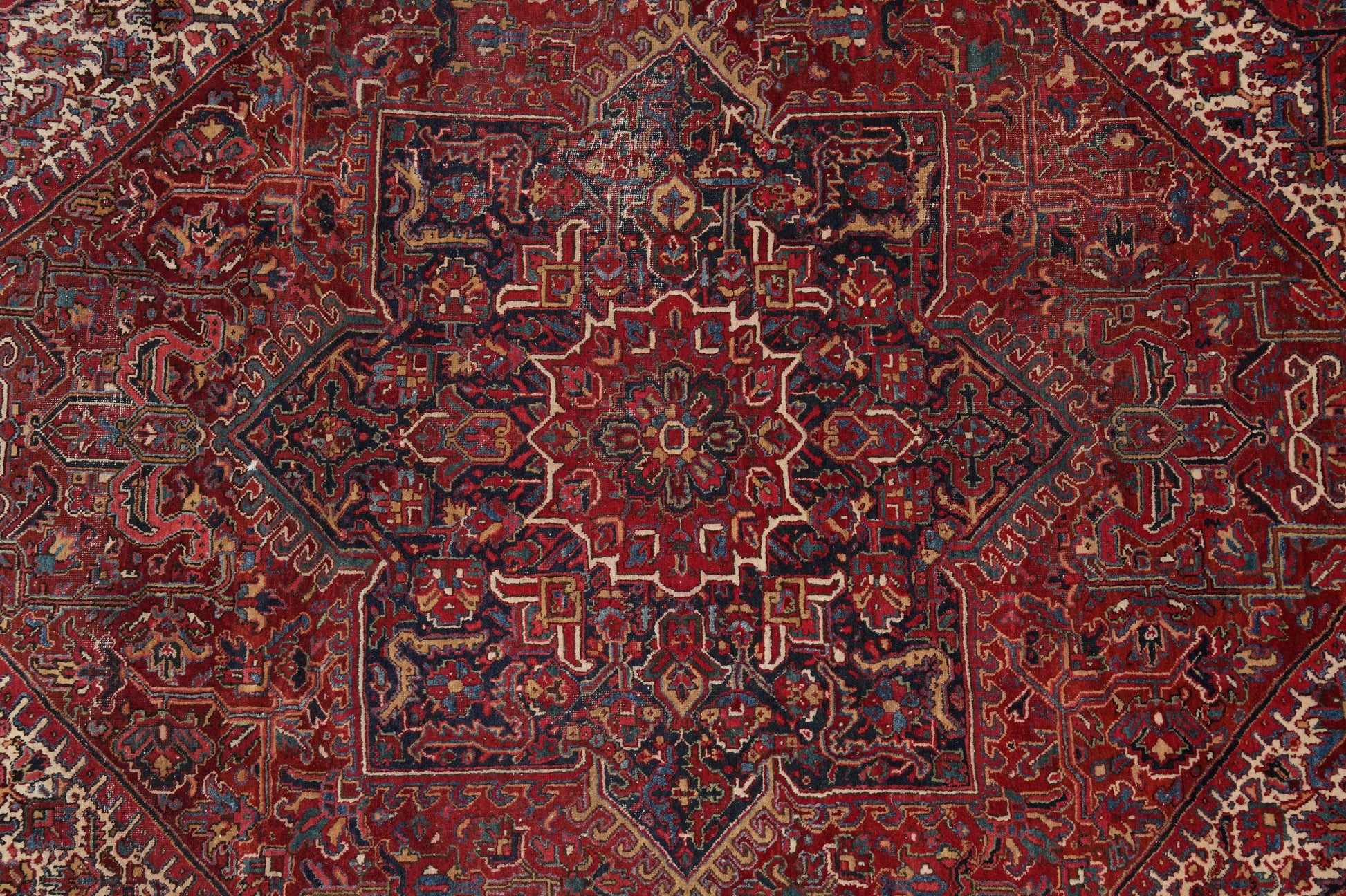 Strong tribal Heriz-style rug, field detail showing red depth and color contrast