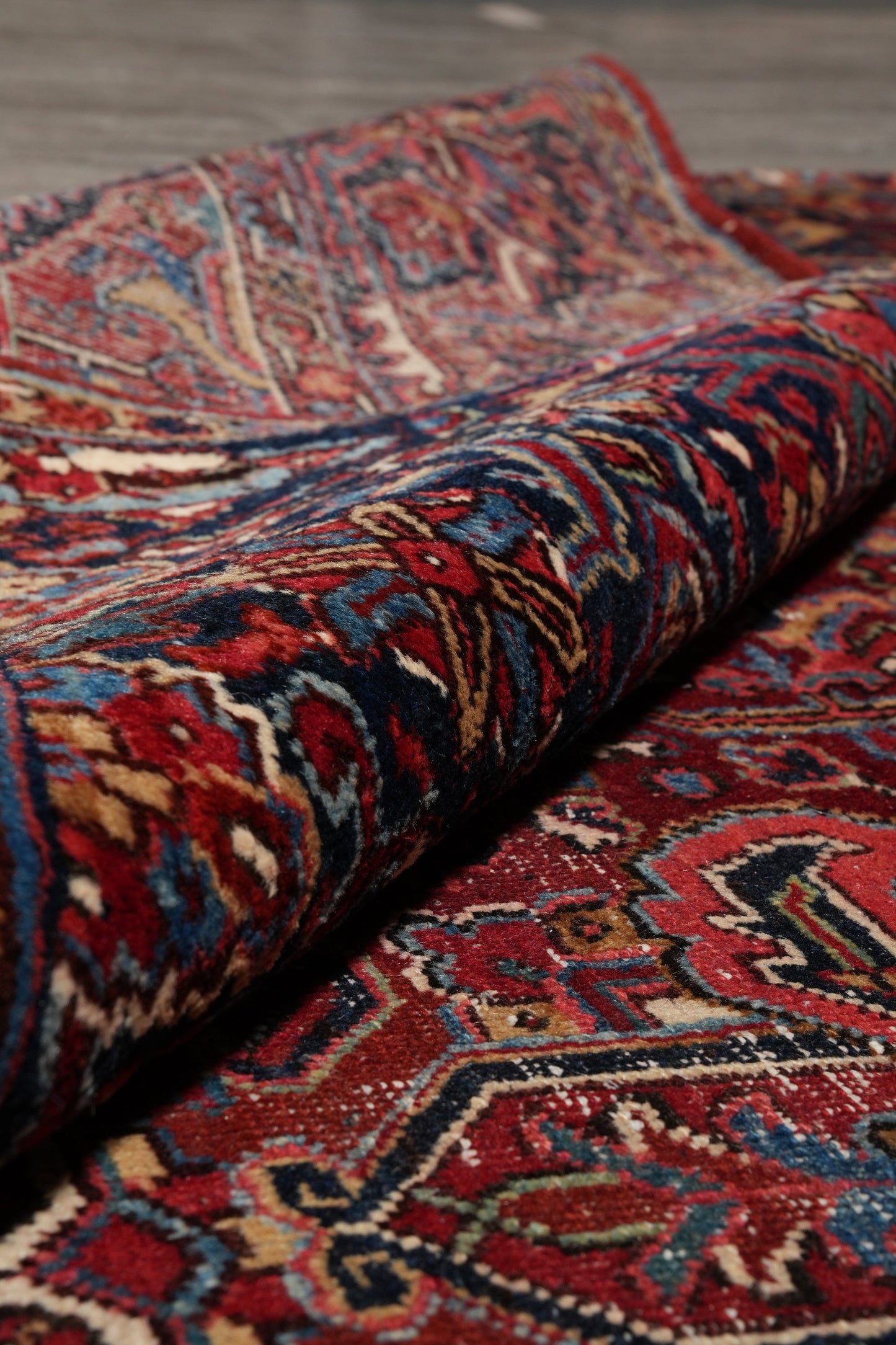 Strong tribal Heriz-style rug, pile texture close-up showing wool depth