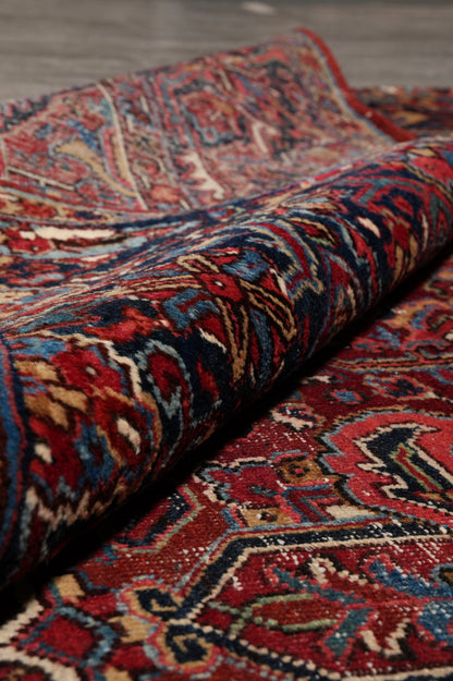 Strong tribal Heriz-style rug, pile texture close-up showing wool depth