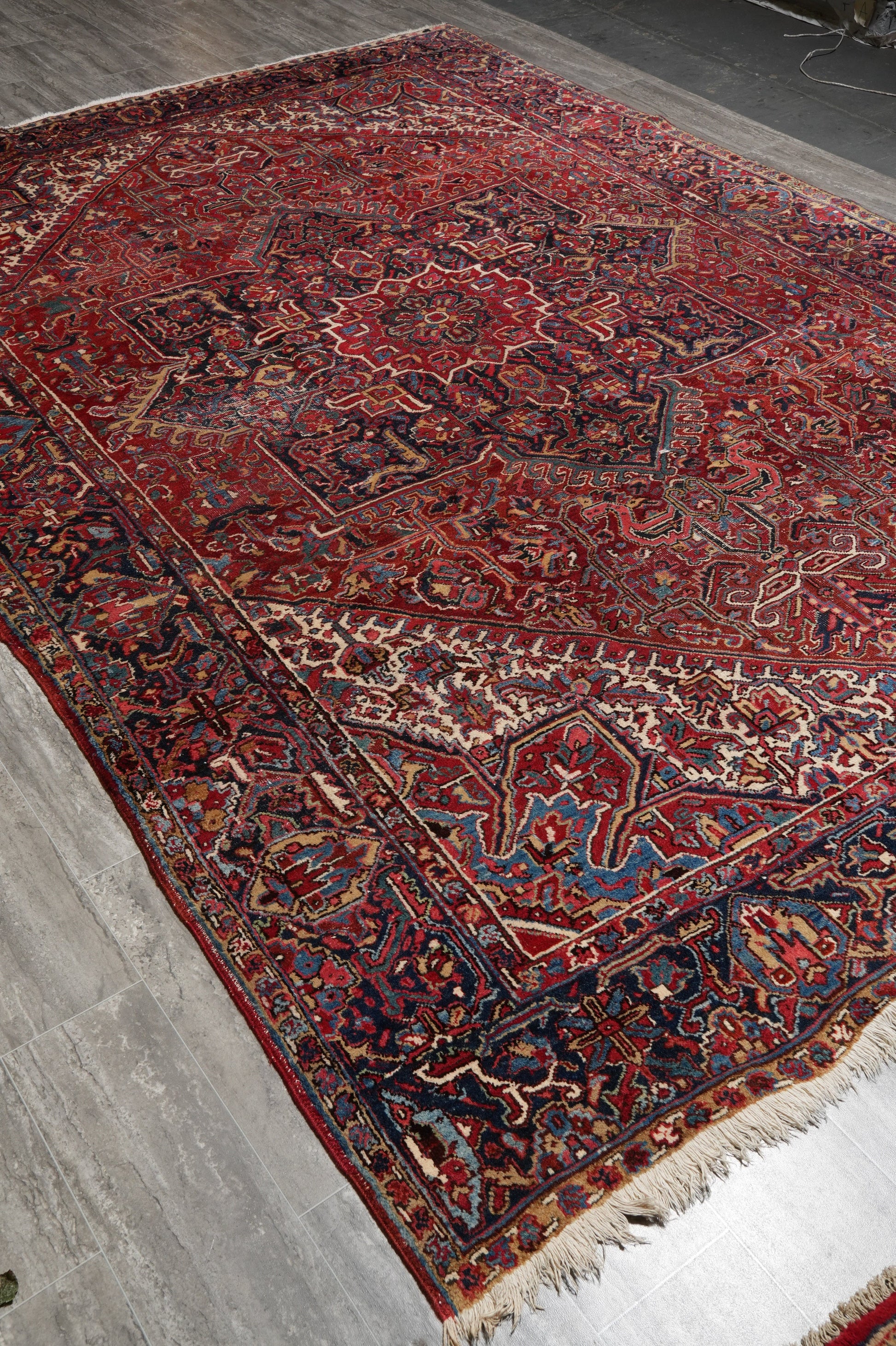 Strong tribal Heriz-style rug, partial overhead view