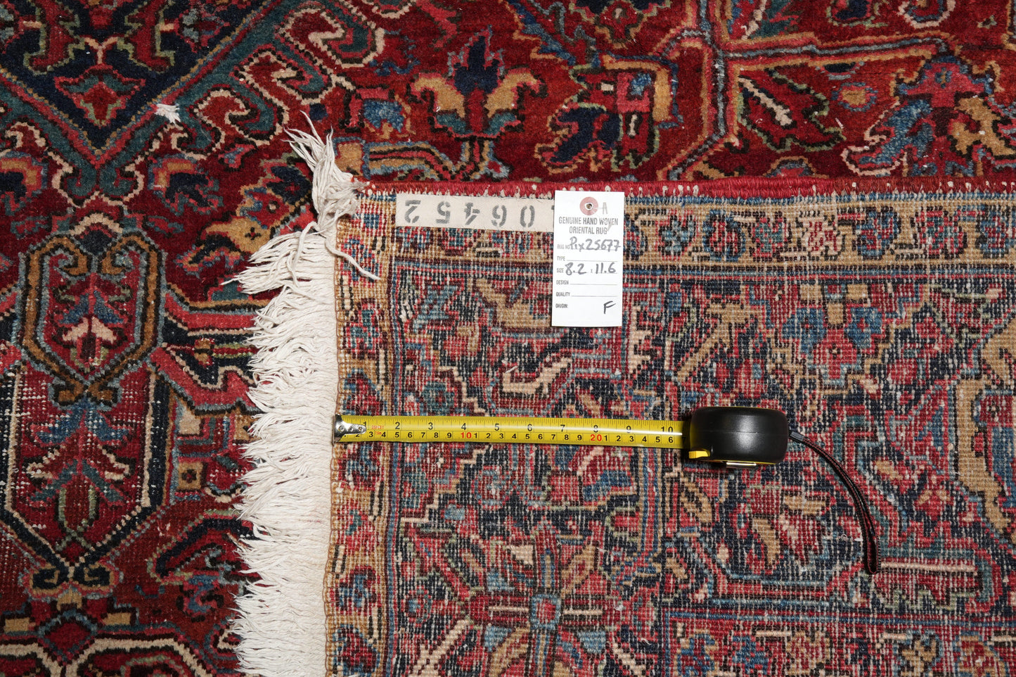 Strong tribal Heriz-style rug, wide alternate-angle full layout