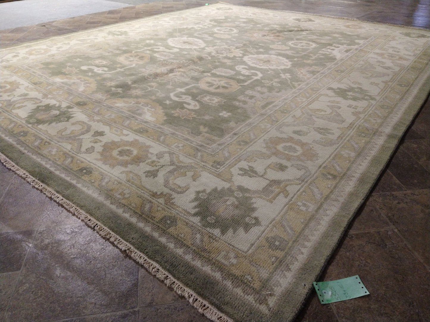 Oushak sage rug, corner motif with relaxed pattern density