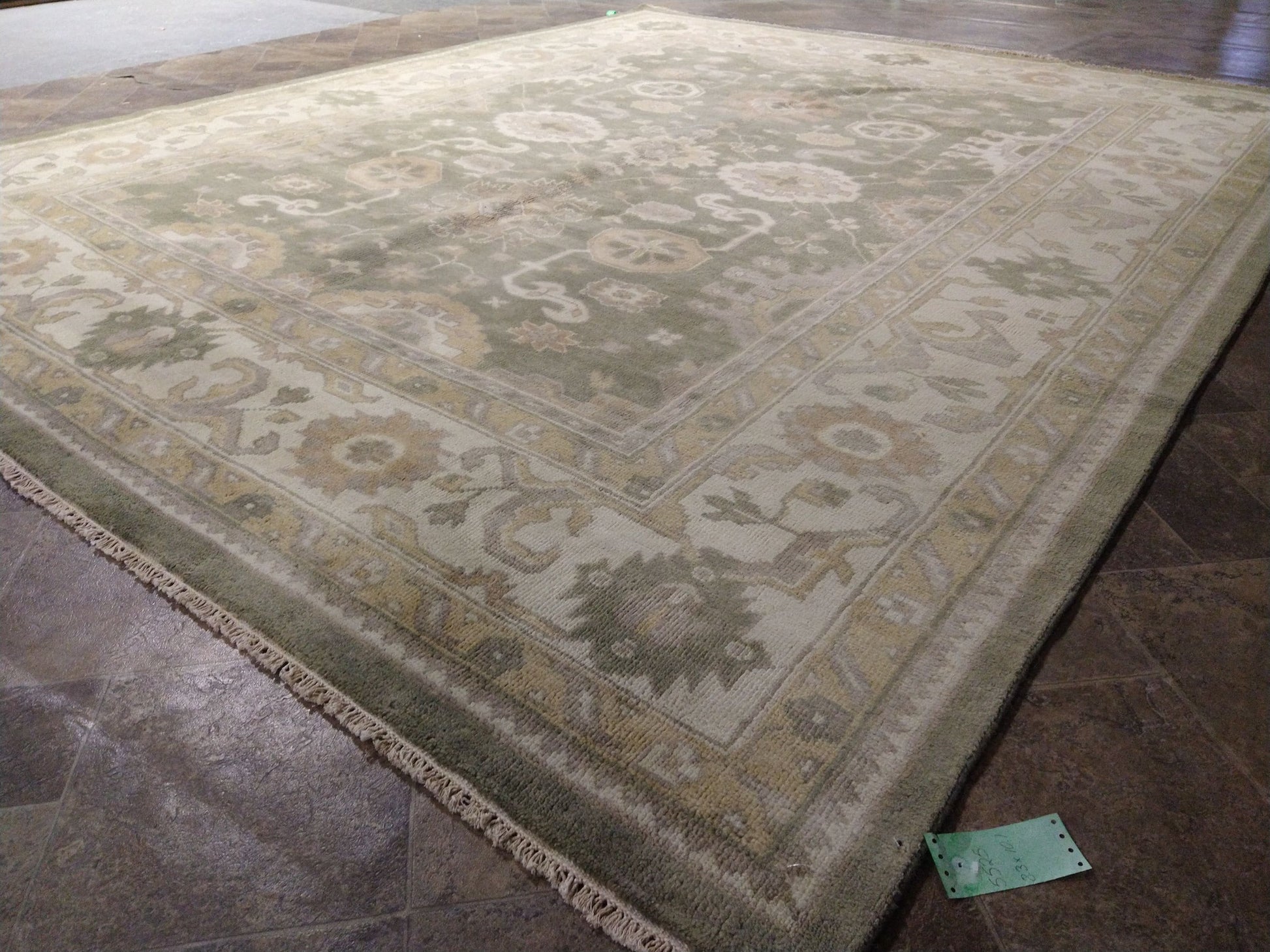 Oushak sage rug, corner motif with relaxed pattern density