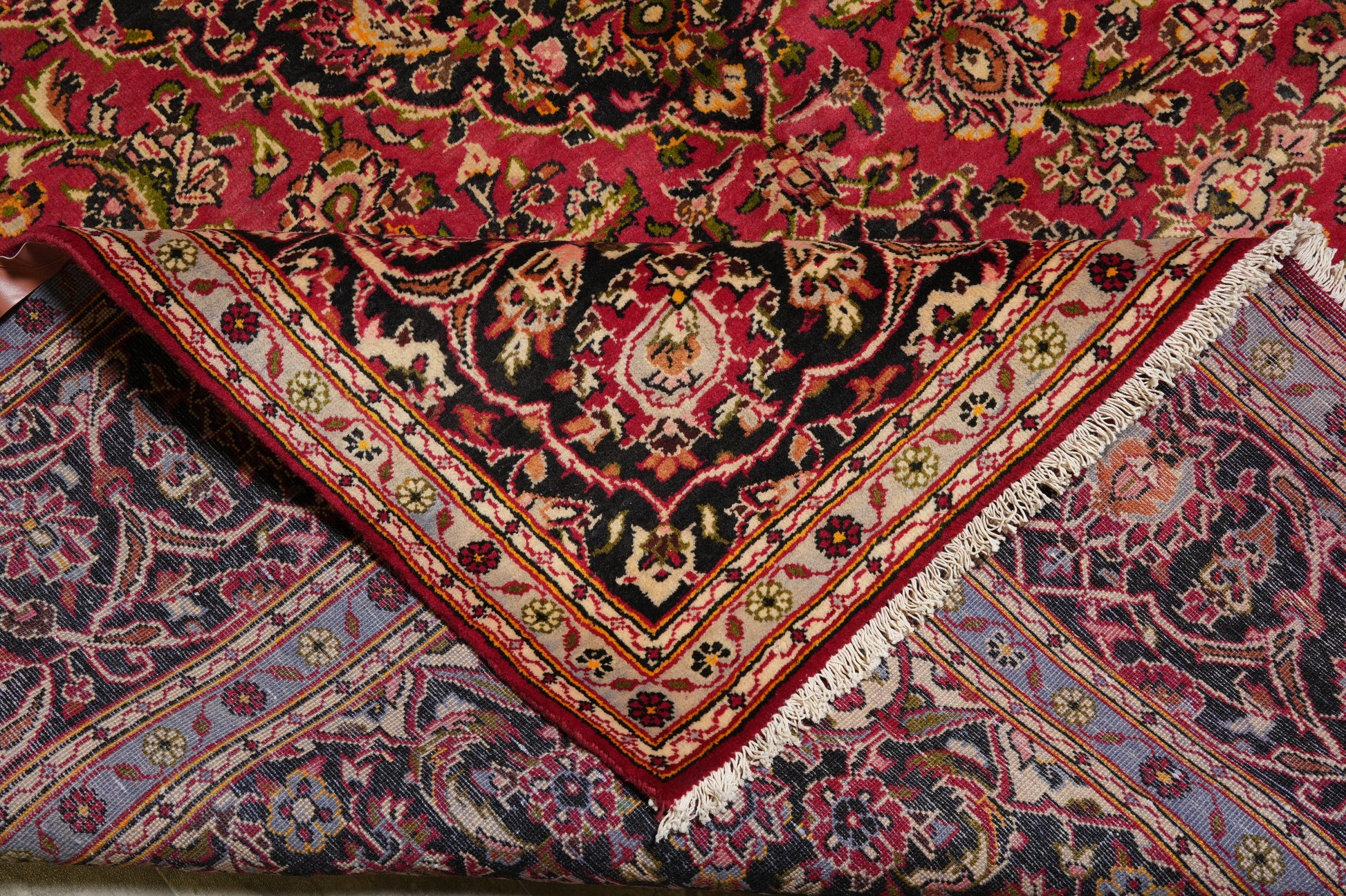 Kashan-style rug, alternate corner with floral detail