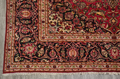 Kashan-style rug, color balance close-up between red field and ivory medallion