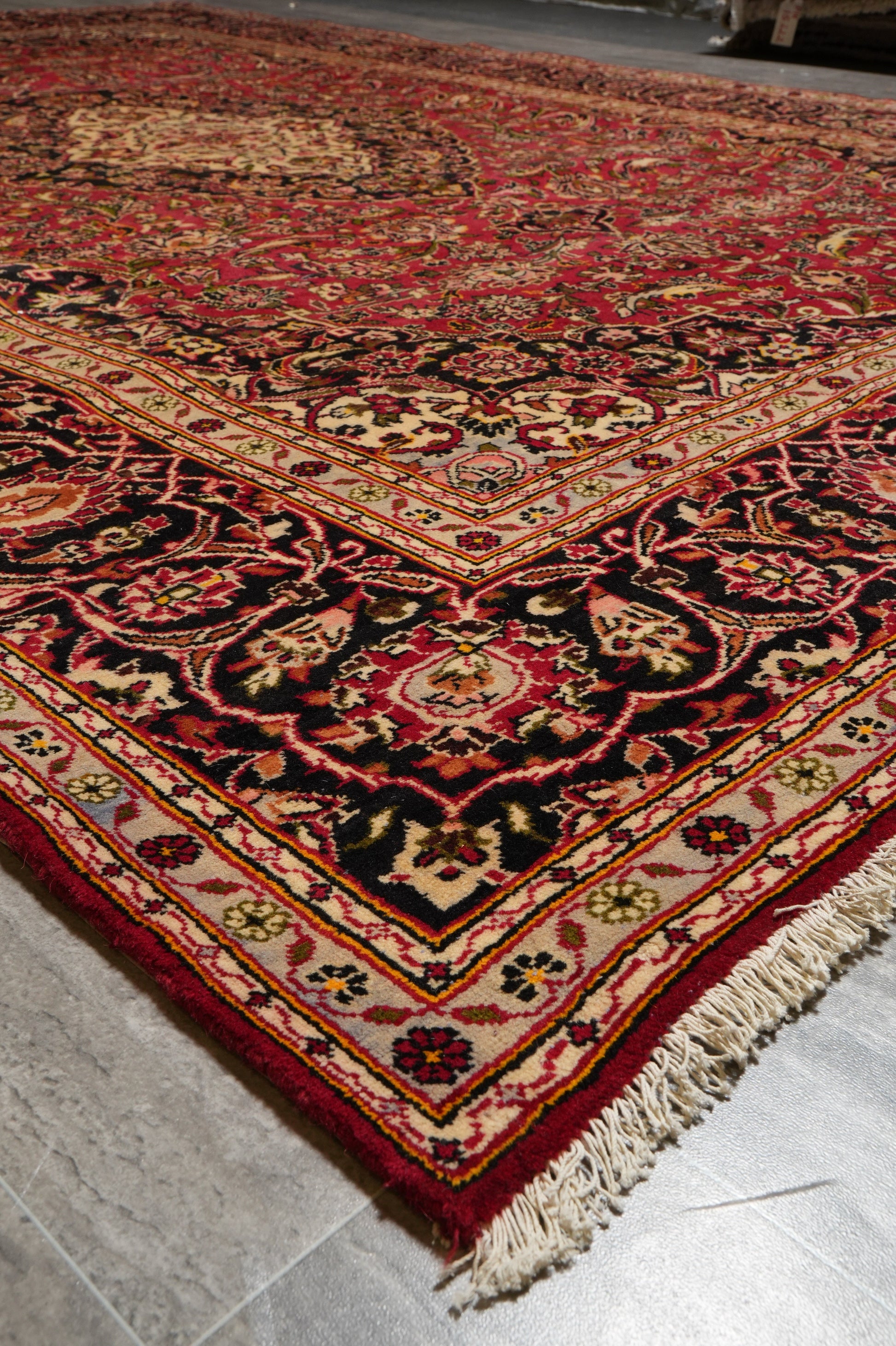 Kashan-style rug, partial overhead view in natural light