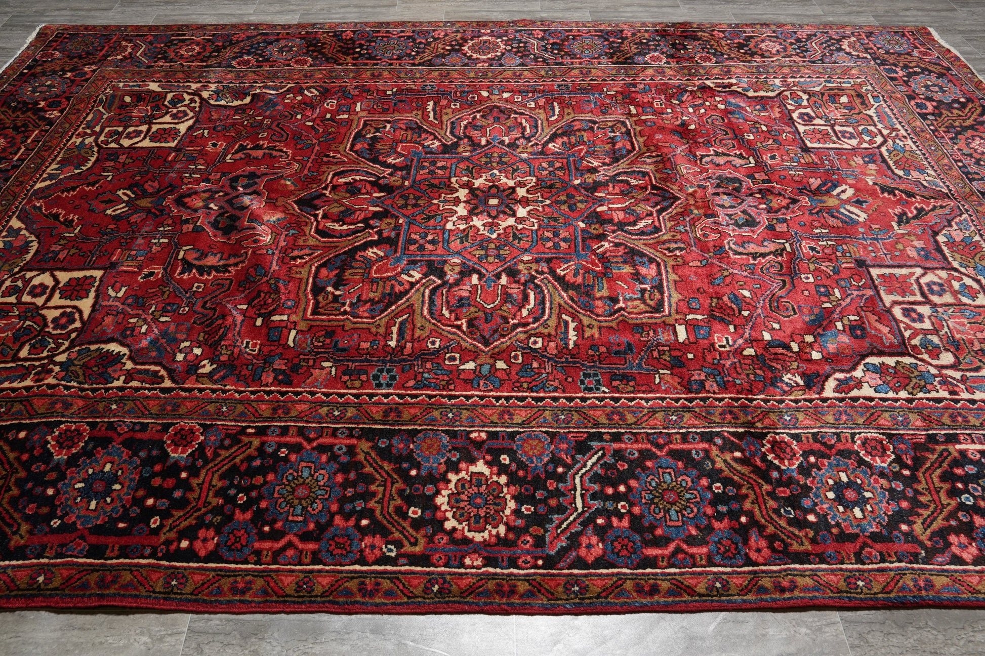 Sherabian-pattern rug, central medallion close-up with floral detail in geometric frame