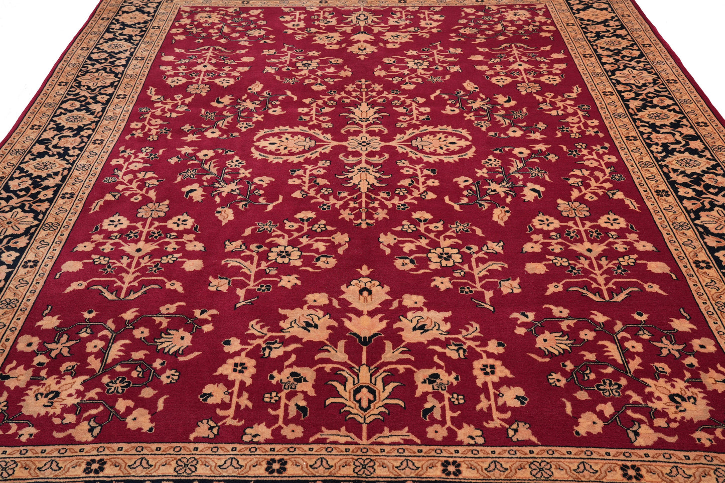 Sarouk-pattern wool rug, border pattern detail in burgundy and ivory