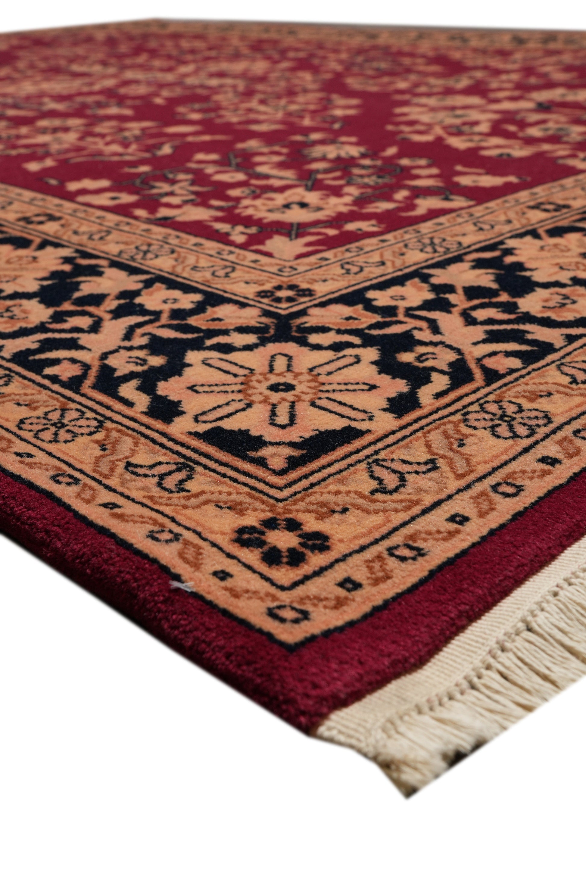 Sarouk-pattern wool rug, pile texture close-up showing dense wool
