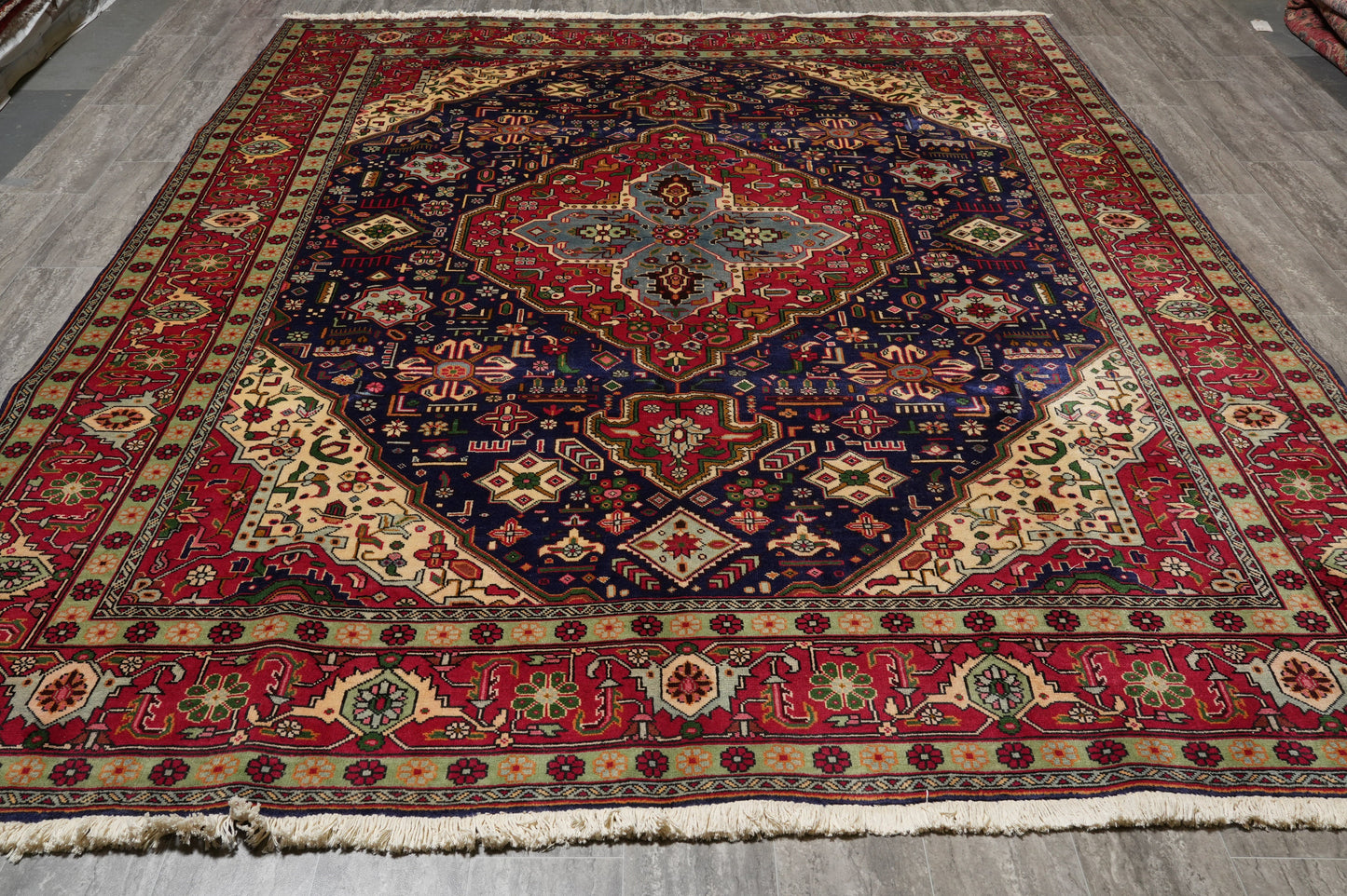 Pre-owned Tabriz-style blue rug, fine curvilinear pattern detail