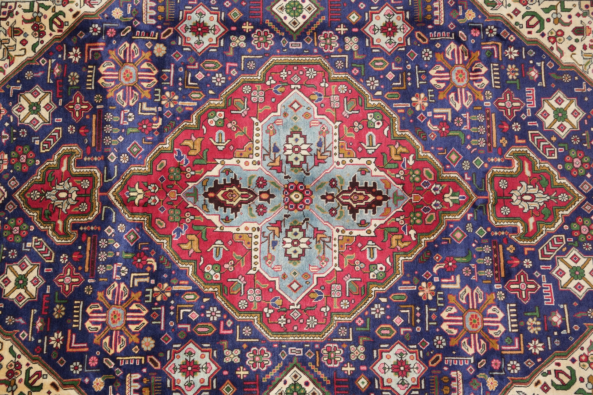 Pre-owned Tabriz-style blue rug, border pattern with refined detail