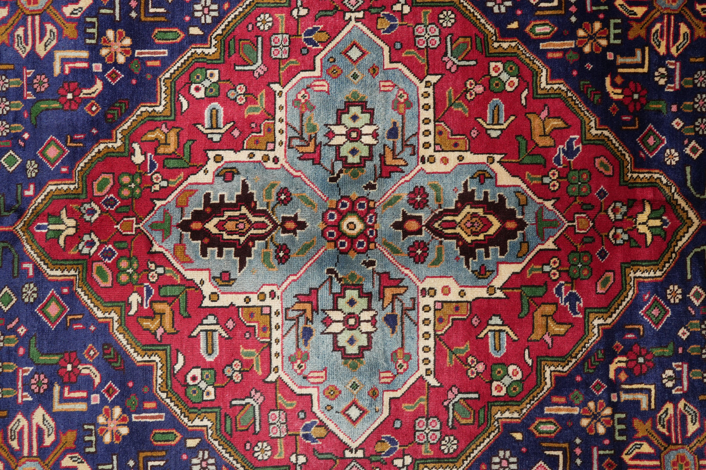 Pre-owned Tabriz-style blue rug, corner motif with floral arabesques