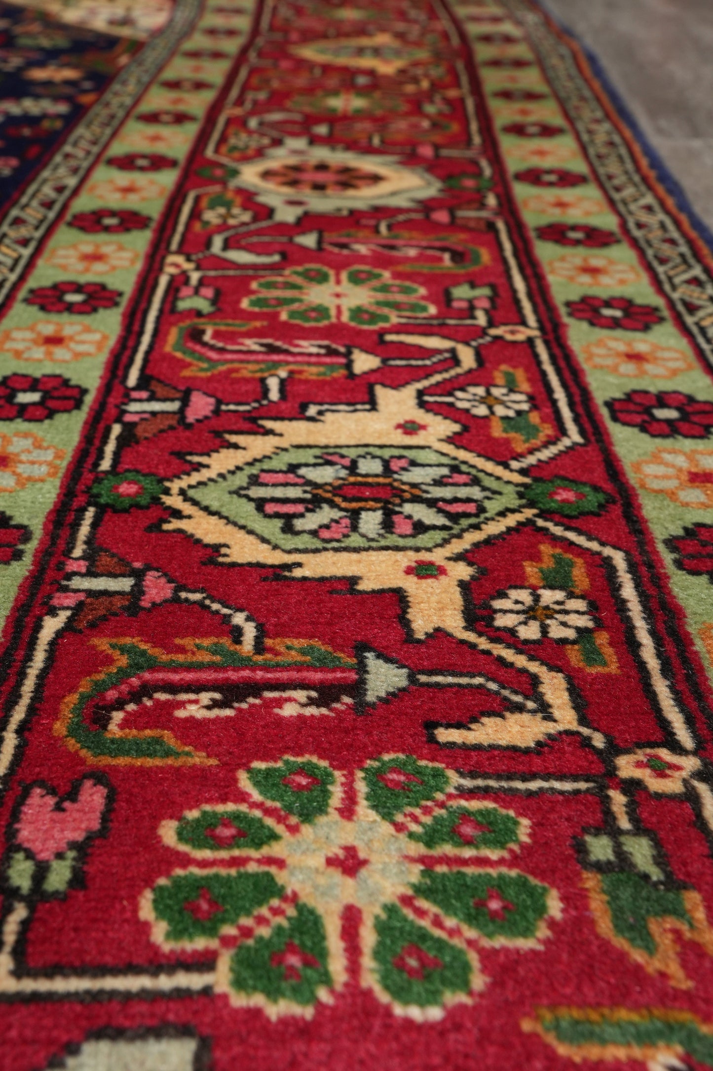 Pre-owned Tabriz-style blue rug, color balance close-up showing soft blue field