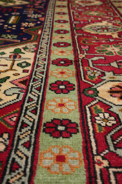 Pre-owned Tabriz-style blue rug, alternate corner showing pattern continuity