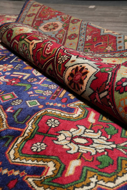 Pre-owned Tabriz-style blue rug, mid-field detail showing wool depth