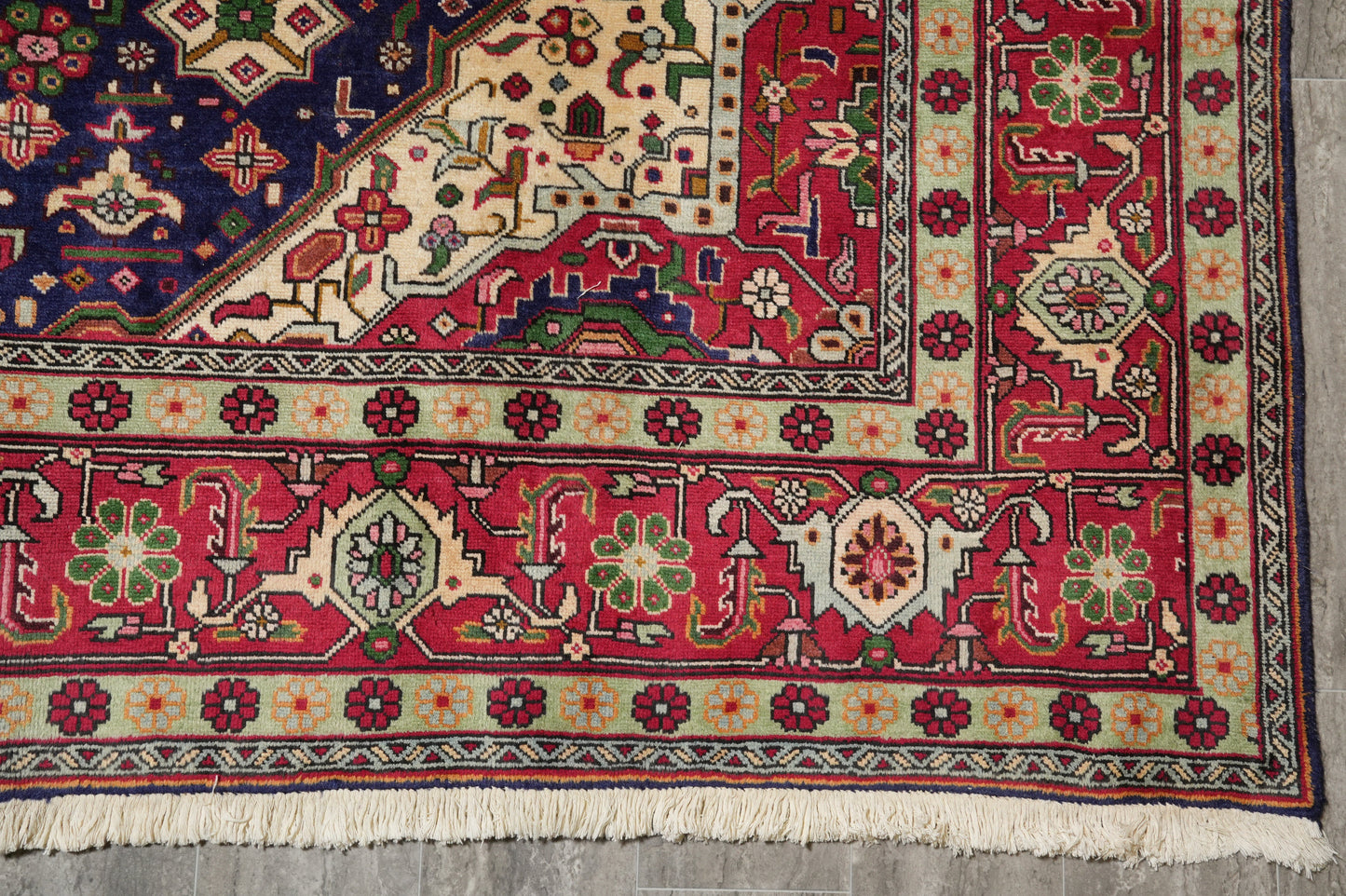 Pre-owned Tabriz-style blue rug, pile texture close-up
