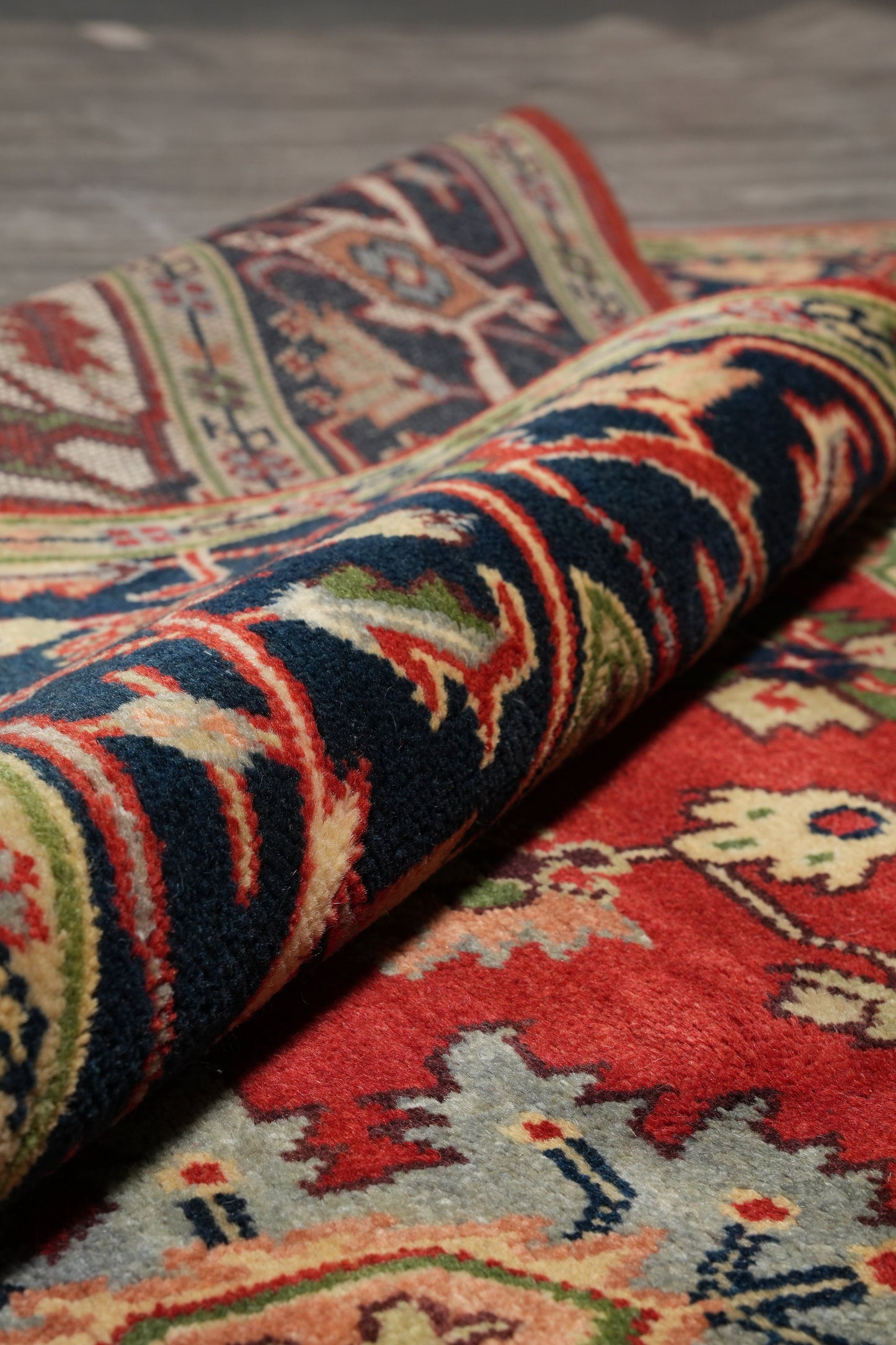 Heriz-Serapi-style rug, pile texture close-up showing wool depth
