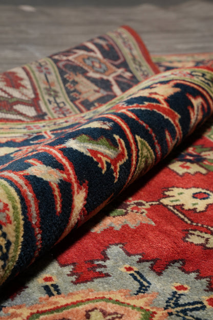 Heriz-Serapi-style rug, pile texture close-up showing wool depth