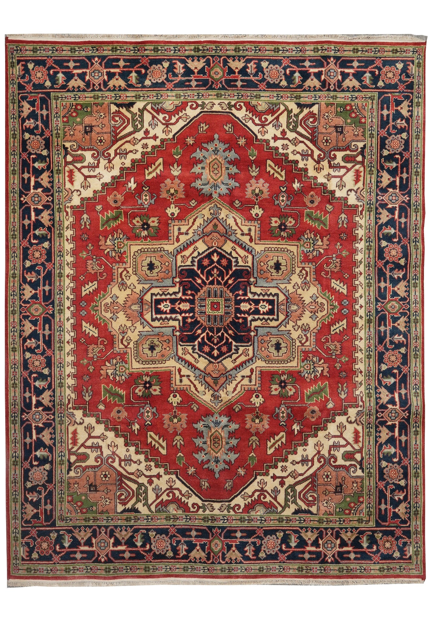 8 x 10 hand-knotted Heriz-Serapi-style wool rug with red field and navy medallion, top view