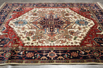 Heriz-Serapi-style rug, central medallion close-up in ivory and navy