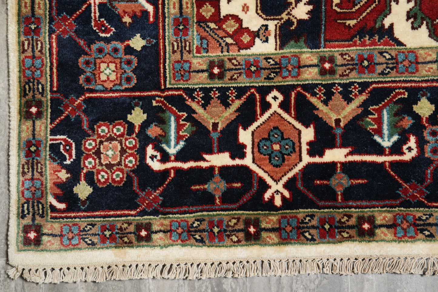 Heriz-Serapi-style rug, partial overhead view in natural light