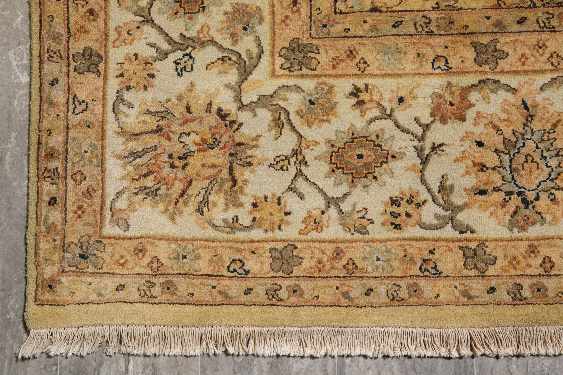 Jaipur gold rug, alternate corner with pattern continuity