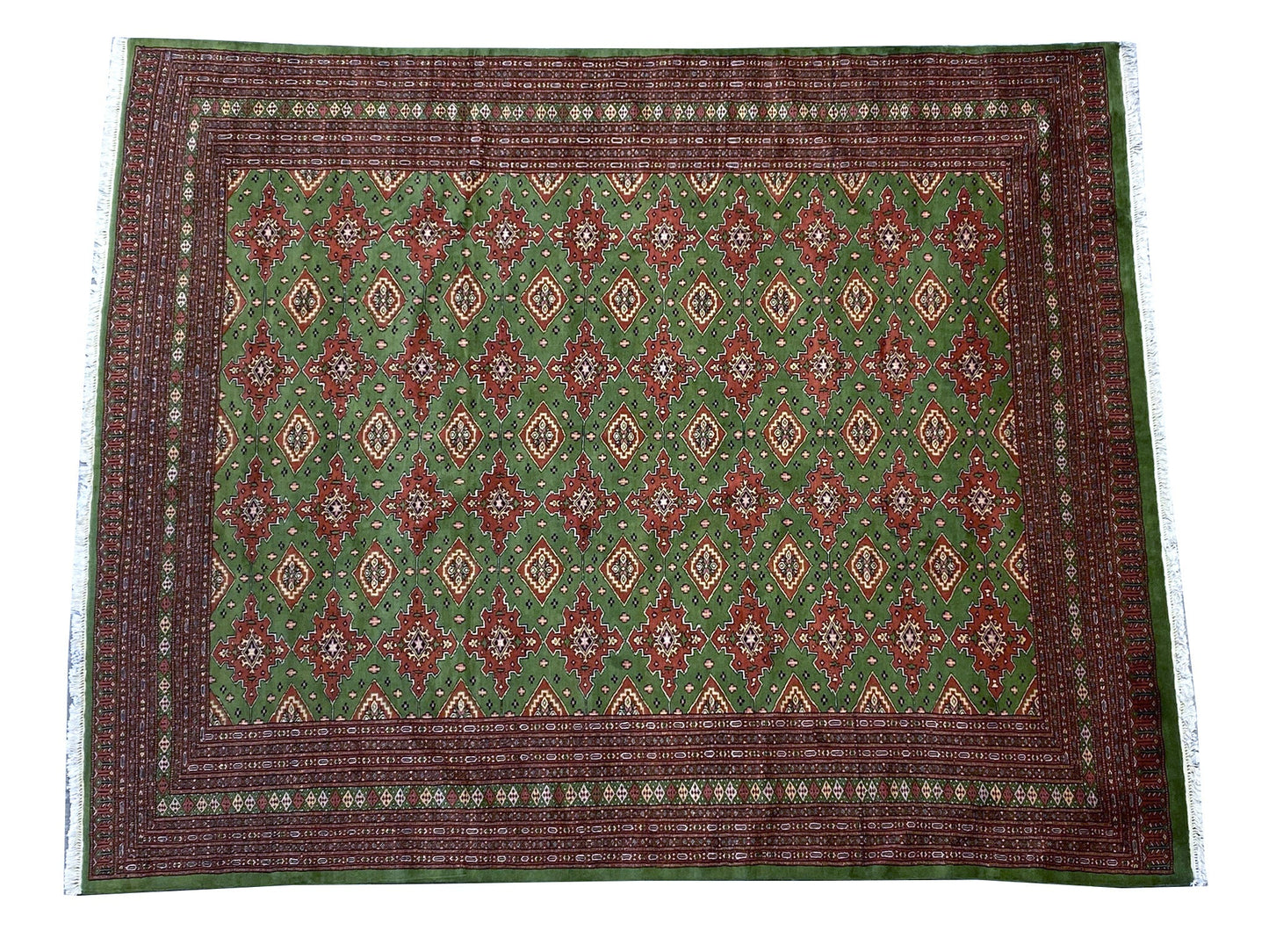 Sage green Jaldar Bokhara, central gul medallion close-up