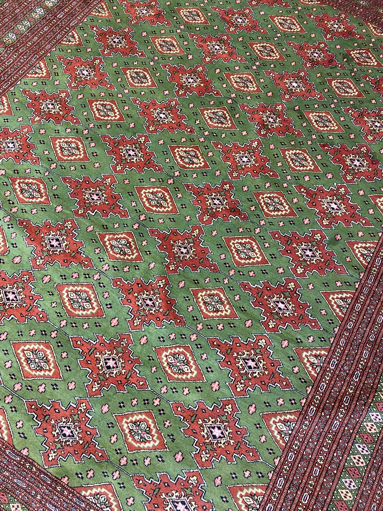 Sage green Jaldar Bokhara, ivory border pattern detail