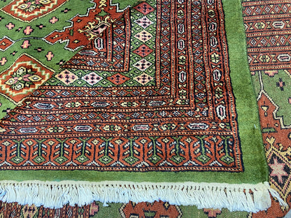Sage green Jaldar Bokhara, corner motif with traditional gul