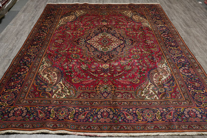 Pre-owned Tabriz-style blue rug, fine curvilinear pattern close-up
