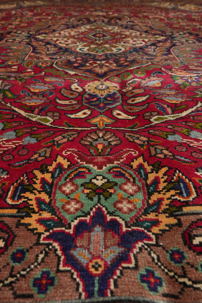 Pre-owned Tabriz-style blue rug, secondary medallion detail