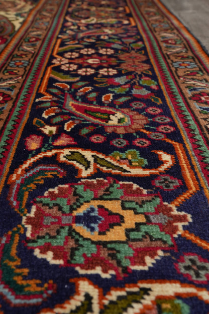 Pre-owned Tabriz-style blue rug, color balance between soft blue field and ivory accents