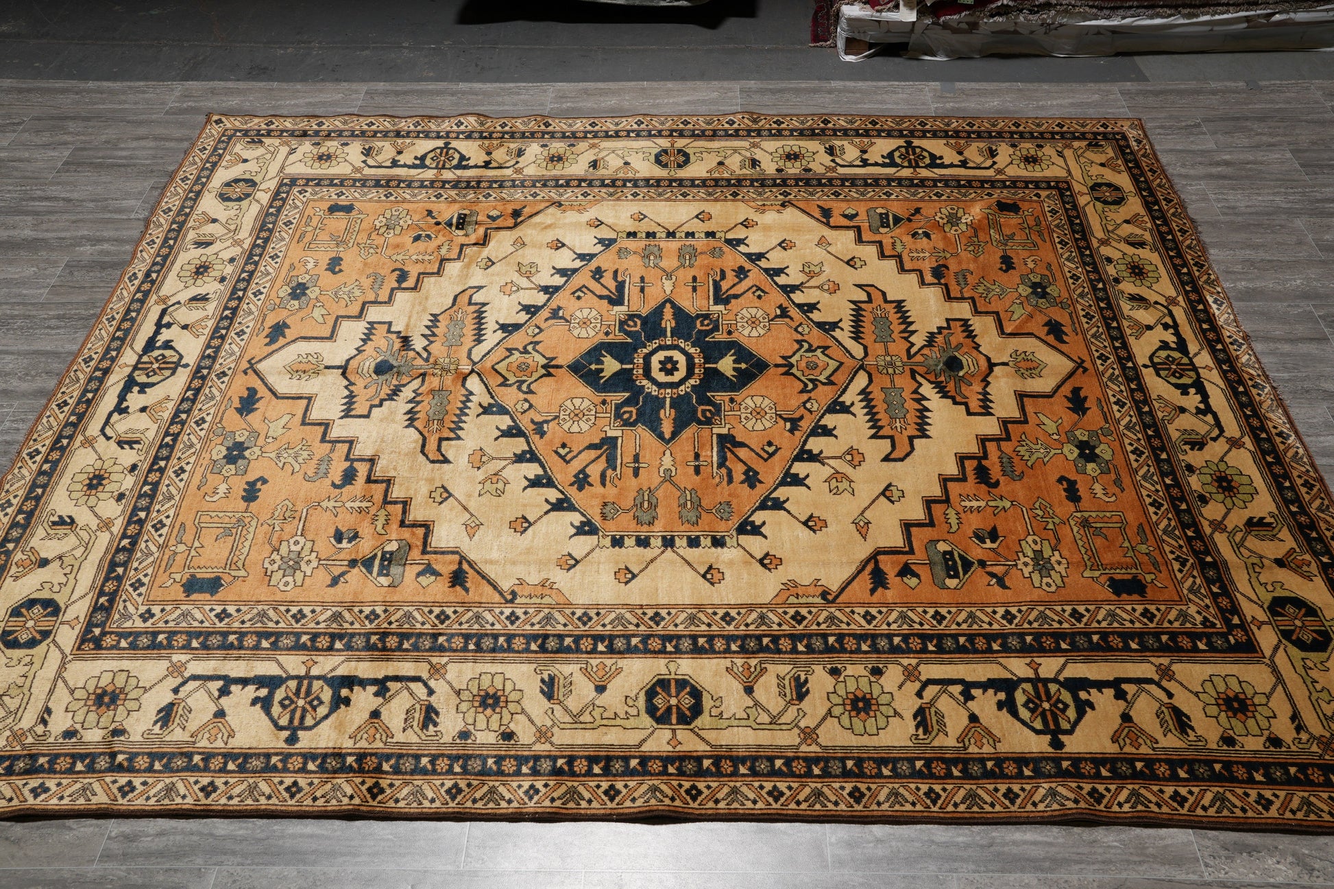 Afghan Chechen Kazak rug, central medallion close-up with dense tribal geometry